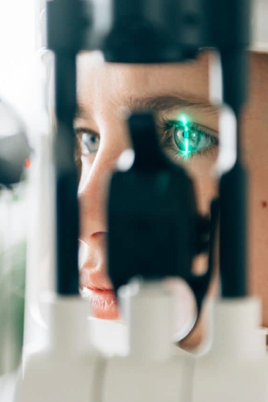 Woman getting a retinal imaging scan